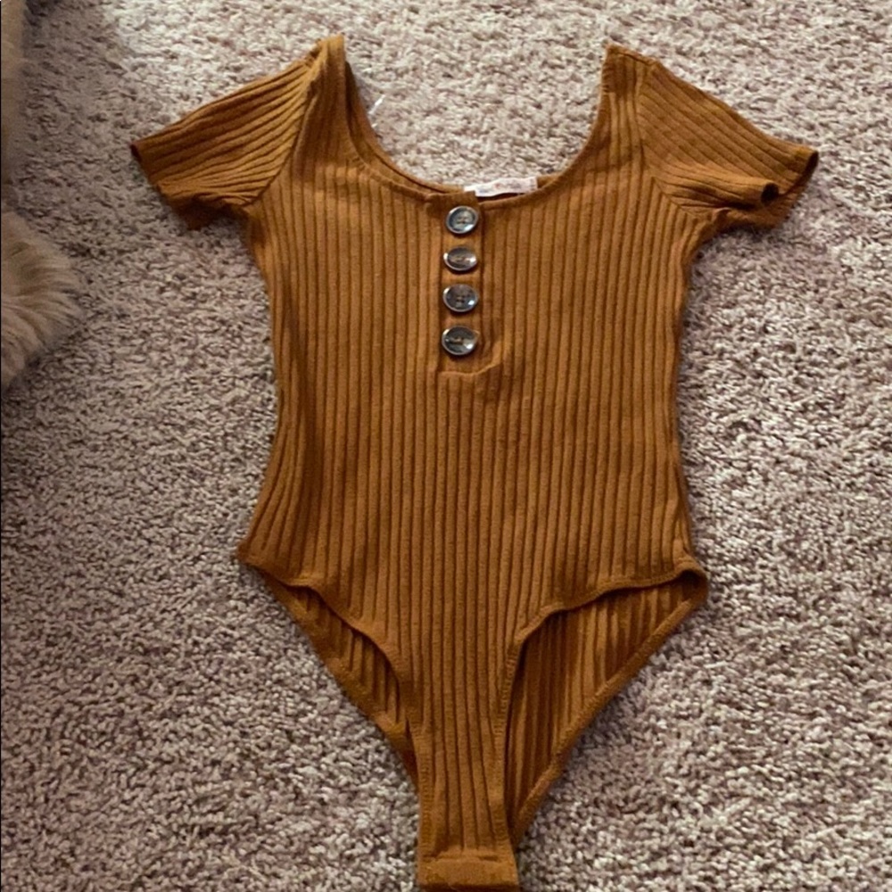 brown and yellow body suits